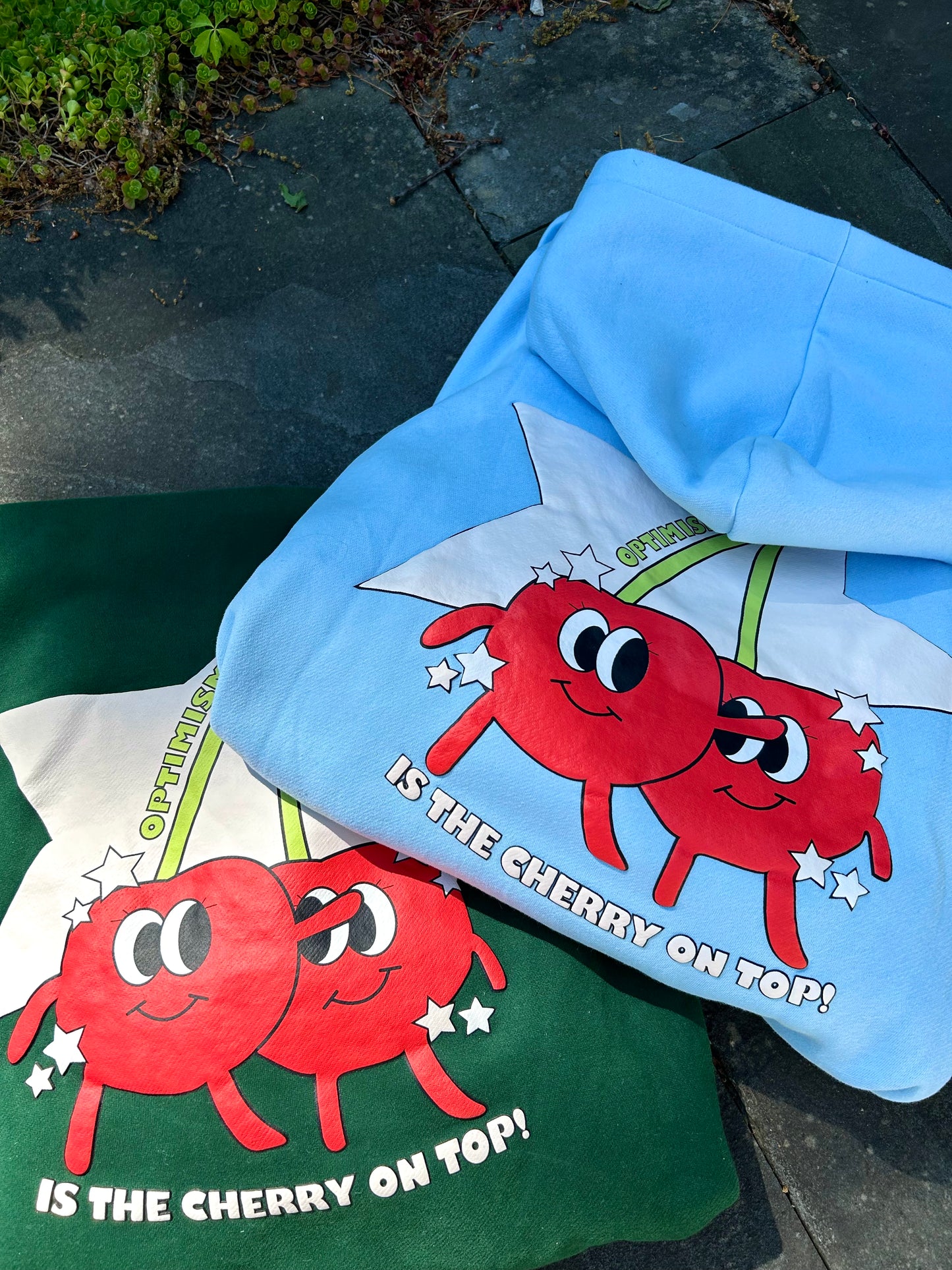 Baby Blue “Optimism is the Cherry on Top” Puff Letter Limited Edition Hoodie
